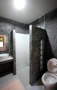 A bathroom at Aonang Lodge - SHA