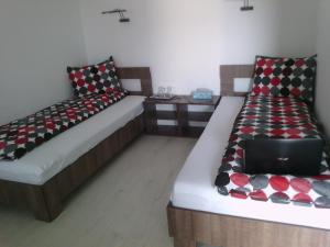 Letto o letti in una camera di Complex Turistic Dávid