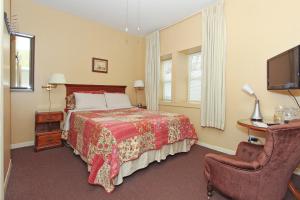 Ein Bett oder Betten in einem Zimmer der Unterkunft Gower Guest House