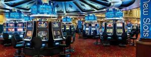 a bunch of slot machines in a casino at Ameristar Casino Hotel Kansas City in Randolph