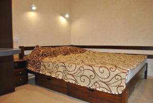 a bed in a room with at Uytno in Chornomorsk