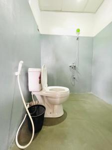 a bathroom with a toilet with a hose at Bella Ella in Ella +92 photos