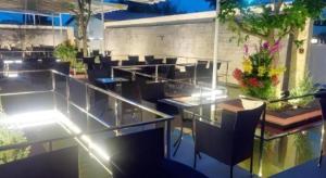 Un restaurant u otro lugar para comer en New Palace Bac Lieu Hotel