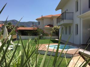a view of the backyard of a house at Crescent Twins -White Villa in Dalyan