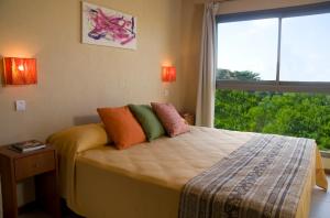 Et rom på Viñas del Mar Apart & SPA Aparthotel