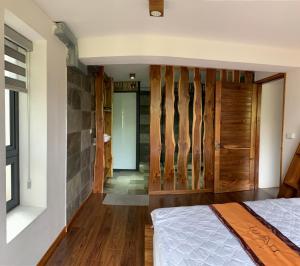 Postel nebo postele na pokoji v ubytování Luma of Serenity