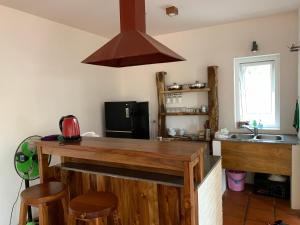 Kuchyň nebo kuchyňský kout v ubytování Luma of Serenity + 3 fotografie