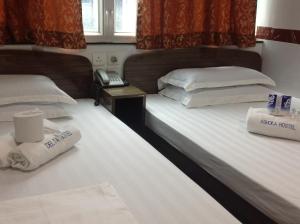 Postelja oz. postelje v sobi nastanitve Woodstock Hostel