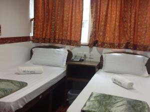 Postelja oz. postelje v sobi nastanitve Woodstock Hostel