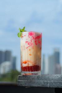 a drink sitting on top of a table at Sawana Suites in Jakarta