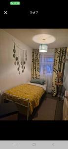 Postel nebo postele na pokoji v ubytování The Green Box + 3 fotografie