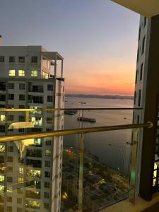 a view of the ocean from a balcony of a building at Sapphire home S2 in Ha Long