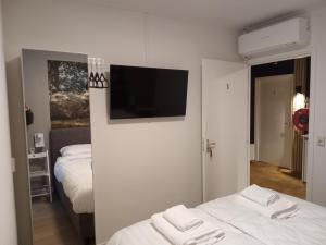 Postel nebo postele na pokoji v ubytování Herberg van Loon