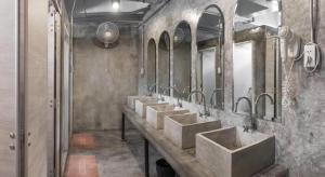 a row of sinks in a bathroom with mirrors at Vm1 Hostel in Bangkok +208 photos