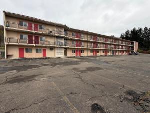 an empty parking lot in front of a building at Kiteville Bradford in Bradford