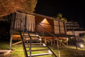 a staircase leading up to a house at night at Bungalow da Romy in Vila Praia de Âncora
