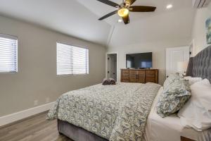 a bedroom with a bed and a ceiling fan at Destination #41 in Fullerton