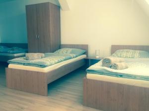 Postel nebo postele na pokoji v ubytování Guest House Hodus