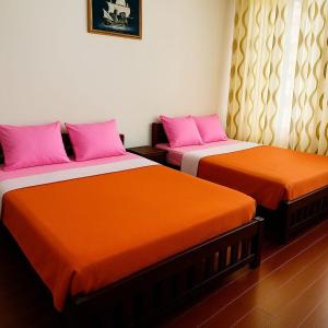 Ένα ή περισσότερα κρεβάτια σε δωμάτιο στο Hotel Ceylan Crest Ella +2 φωτογραφίες