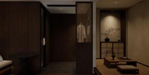 a room with a door leading to a living room at The Panda Artisan, Taikoo Li Xilia Hotel in Chengdu
