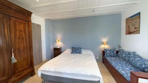 Postel nebo postele na pokoji v ubytování Superbe villa proche de la mer + 5 fotografií