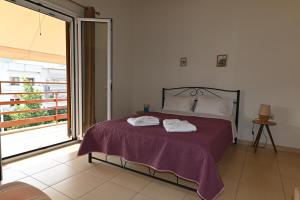 Ένα ή περισσότερα κρεβάτια σε δωμάτιο στο Elias House