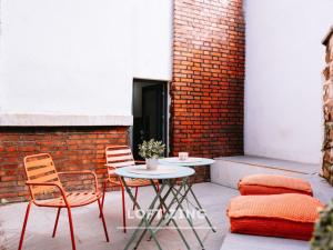 Posezení v ubytování Les Lofts Stéphanois - Au cœur de Sainte-Etienne