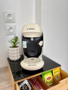 a food processor sitting on top of a table at Dalikyda L'escale Havraise Free Parking in Le Havre