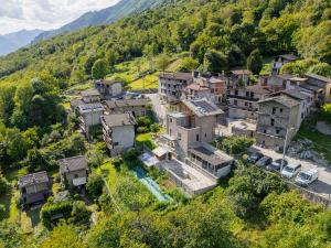 an aerial view of a village in the mountains at Il nido di Siro in Cercino