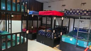 a group of bunk beds in a room at Sunny hostel in Pai +5 photos