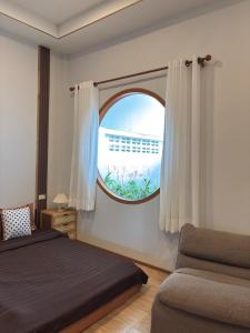 Voodi või voodid majutusasutuse เอ็นแอนด์เอ็นรีสอร์ทวีไอพี toas