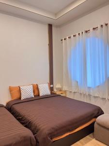 Voodi või voodid majutusasutuse เอ็นแอนด์เอ็นรีสอร์ทวีไอพี toas +13 fotot