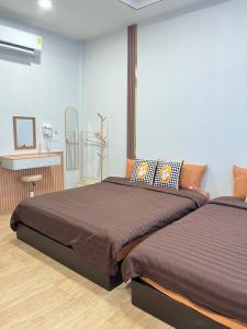 Voodi või voodid majutusasutuse เอ็นแอนด์เอ็นรีสอร์ทวีไอพี toas