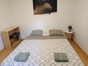 Postel nebo postele na pokoji v ubytování Maisonnette proche de Strasbourg