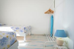 Voodi või voodid majutusasutuse Terrazza sul mare - Beach front toas