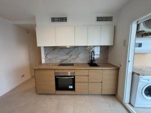 Kuchyň nebo kuchyňský kout v ubytování Apartaments Wasela 104