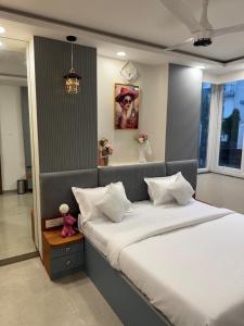 Postel nebo postele na pokoji v ubytování Urban Central