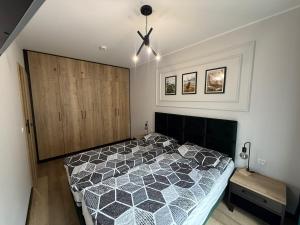 Postel nebo postele na pokoji v ubytování Źródło Izery apartament 41
