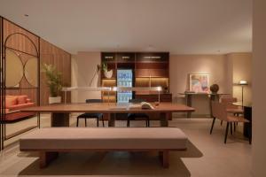 Posezení v ubytování Express by M Village Nguyen The Loc - Modern Airport Stay