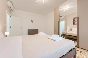 Postel nebo postele na pokoji v ubytování Elisa Flat - 15 min from Venice & Wi-Fi