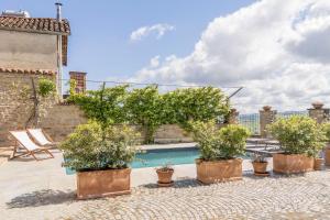 Πισίνα στο ή κοντά στο Ca Renato Grane' Apartment With Pool, Monforte