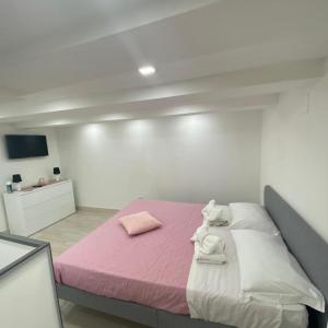 Ένα ή περισσότερα κρεβάτια σε δωμάτιο στο Casa Vacanza , Marianna