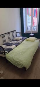 Postel nebo postele na pokoji v ubytování Cosy Appart 3 nuits minimum