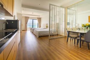 Ένα ή περισσότερα κρεβάτια σε δωμάτιο στο Căn Hộ View Biển Quy Nhơn - FLC Lux Chilling APT Trung Tâm TP