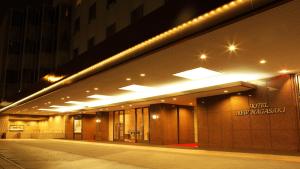 a building with lights on the side of it at Hotel New Nagasaki in Nagasaki