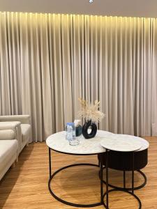 Ένα ή περισσότερα κρεβάτια σε δωμάτιο στο شقق وأستوديوهات فخمة Skyline luxurious Apartments and Studios Riyadh