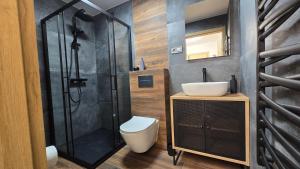 Koupelna v ubytování Apartamenty Żurawia 1- Piętro 2 + 18 fotografií