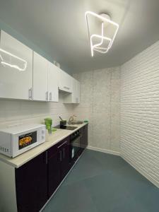 Una cocina o cocineta en Апартаменты Соборная площадь/Дерибасовская