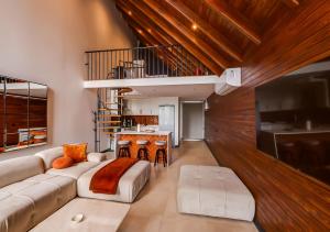 a living room with a white couch and a table at Sunshine Villa in Atakum +49 photos