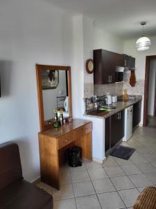 a kitchen with a sink and a counter top at Cabo dream in Cabo Negro
